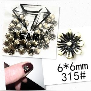 $1 FLOWER NAIL CHARMS. NEW. $1 WITH ANY $10 ORDER OR MORE